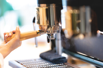 professional espresso coffee machine for making caffeine hot drink, fresh beverage prepare bar maker in cafeteria breakfast,  brown and black, for barista pouring a cup in shop cafe shop