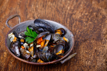 mussels on dark wood