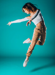 Contemporary style dancer on blue wall