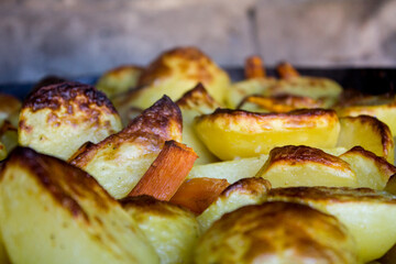 Potatoes, carrots and onions cooked