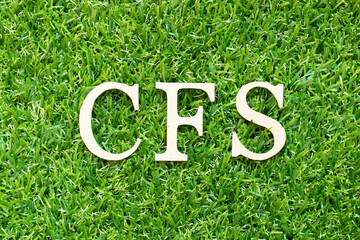 Alphabet letter in word CFS (Abbreviation of Container Freight Station, Certified fund specialist or Chronic fatigue syndrome) on green grass background