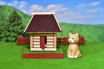 猫と丸太小屋