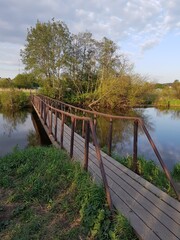 Old pedestrian bridge over the river