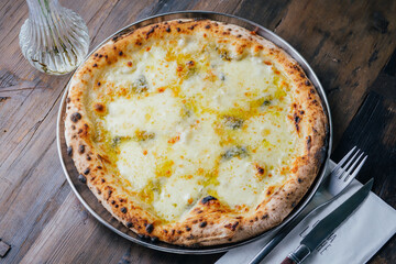 4 cheese pizza on a plate