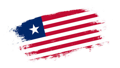 Flag of Liberia country on brush paint stroke trail view. Elegant texture of national country flag