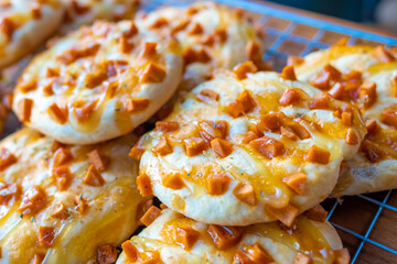 Sausage bread on wooden table in coffee and bakery shop in Champasak town, Southern Laos