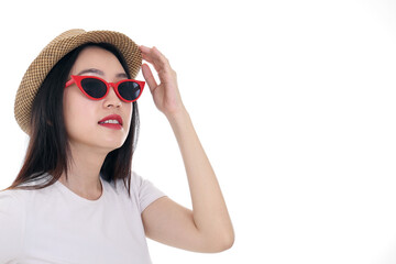 Beautiful young south east Asian woman wearing red frame sunglass eyewear hat pose fashion style white background look around copy text space