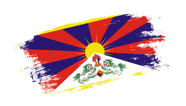 Flag of Tibet country on brush paint stroke trail view. Elegant texture of national country flag