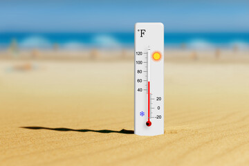 Sea coast at hot summer day. Thermometer in the sand. Ambient temperature plus 58 degrees fahrenheit - obrazy, fototapety, plakaty