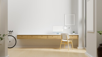 Minimal home working space with computer on the table, mock-up frame on the wall and bicycle, 3D rendering