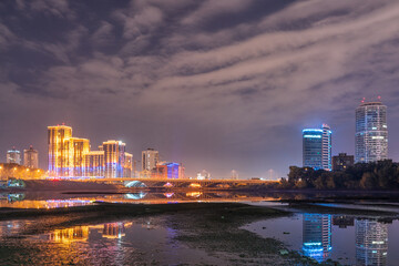 Night on a pond in the center of the city