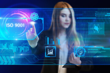 Business, Technology, Internet and network concept. Young businessman working on a virtual screen of the future and sees the inscription: ISO 9001