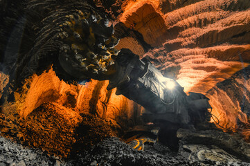 Drilling head of a mine roadheader. Underground mining of ore deposits