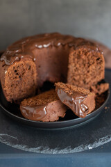 Chocolate bundt cake with slice cut