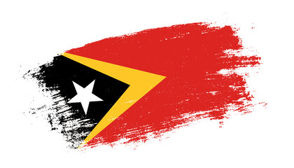 Flag of Timor Leste country on brush paint stroke trail view. Elegant texture of national country flag