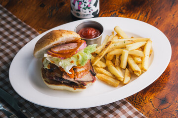 brisket sandwich with French fries and ketchup