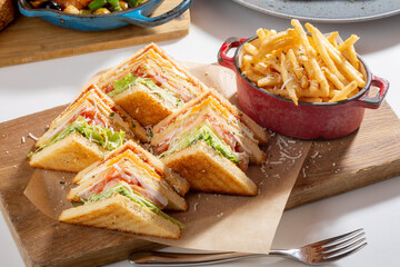 Club sandwich with French fries 