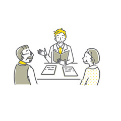 スーツの男性から説明を受ける高齢夫婦
