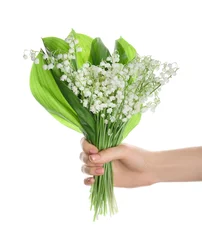 Rolgordijnen Female hand with beautiful lily-of-the-valley flowers on white background © Pixel-Shot