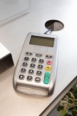 credit card payment terminal grey in shop