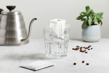 Drip coffee bag in a mug. Trends in brewing coffee at home.