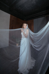 a lot of fat. bride in fancy dress. wedding dress with long arms. dark interior