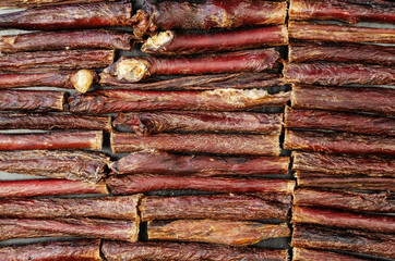Dried dog treat sticks full frame.