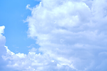 Naklejka na ściany i meble Abstract image of blurred sky. Blue sky background with cumulus clouds