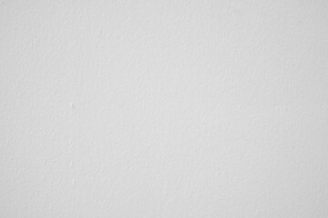 White textured wall background.