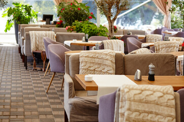 Restaurant or cafe with cozy interior. View of modern dinning room interior