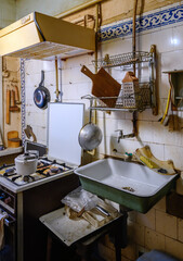 Grunge kitchen with household items