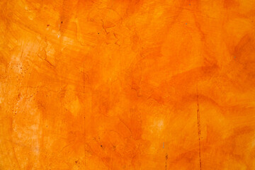 Textured wall brushed painted Background, Abstract Orange Oil Color.