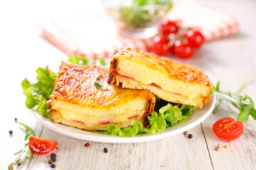 croque monsieur with lettuce and tomato