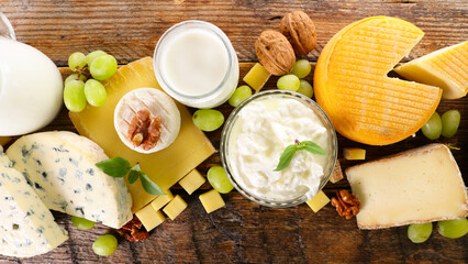 assorted of dairy products on wooden background