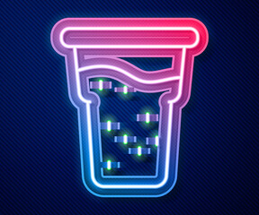Glowing neon line Glass of beer icon isolated on blue background. Vector