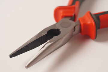 Pliers on white background. Close up image of  Needle Nose Pliers