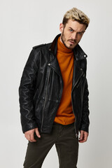 man in fashionable clothes trend of the season studio model leather jacket