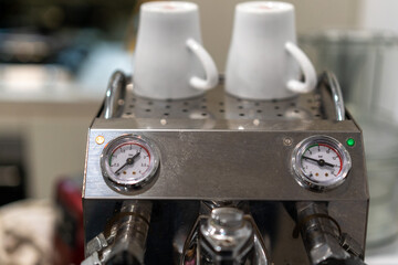 Fototapeta premium coffee machine with coffee cups 