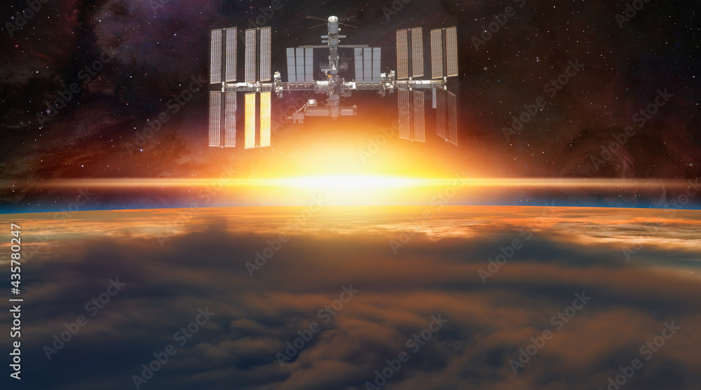 Aufkleber planet earth with a spectacular sunset with iss 