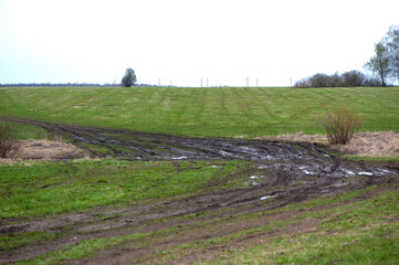 countryside landscape with a muddy road. Off road trips