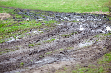 countryside landscape with a muddy road. Off road trips