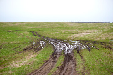 countryside landscape with a muddy road. Off road trips