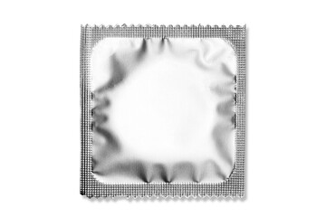 Close up of a condom on white background, wrappers in square and rectangle packaging on white...