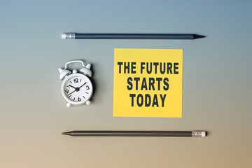 The future starts today - text on sticky note paper. Closeup of a personal agenda. Top view