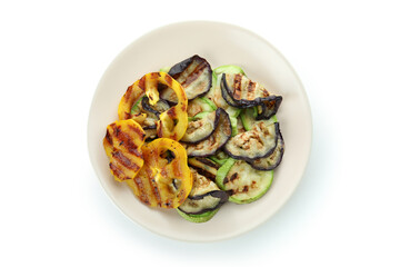 Plate with grilled vegetables isolated on white background