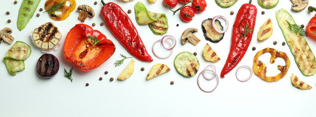 Tasty grilled vegetables on white background, top view