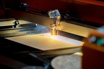 Laser milling engraving machine. Printing Technology - obrazy, fototapety, plakaty