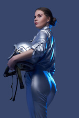 Back view of female astronaut holding helmet © Fxquadro