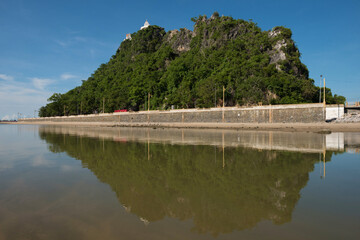 Obraz premium Reflection of Chong krajok mountain,Landmark of Prachuap khirikhan province,Thailand.