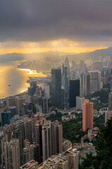 Skyscrapers and cityscape of Hong Kong financial district from Victoria peak and sunrise.